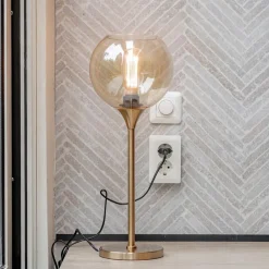Straluma Gouden tafellamp met amber glazen bol 20 cm></noscript> Tafellampen|Klassieke Verlichting