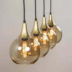 Straluma 4-Lichts eettafelhanglamp zwart/goud met amber glazen bollen></noscript> Eettafellampen|Pendel Lampen
