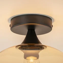 Straluma Mat zwarte plafondlamp met amber glazen bol 30 cm><noscript><img width=